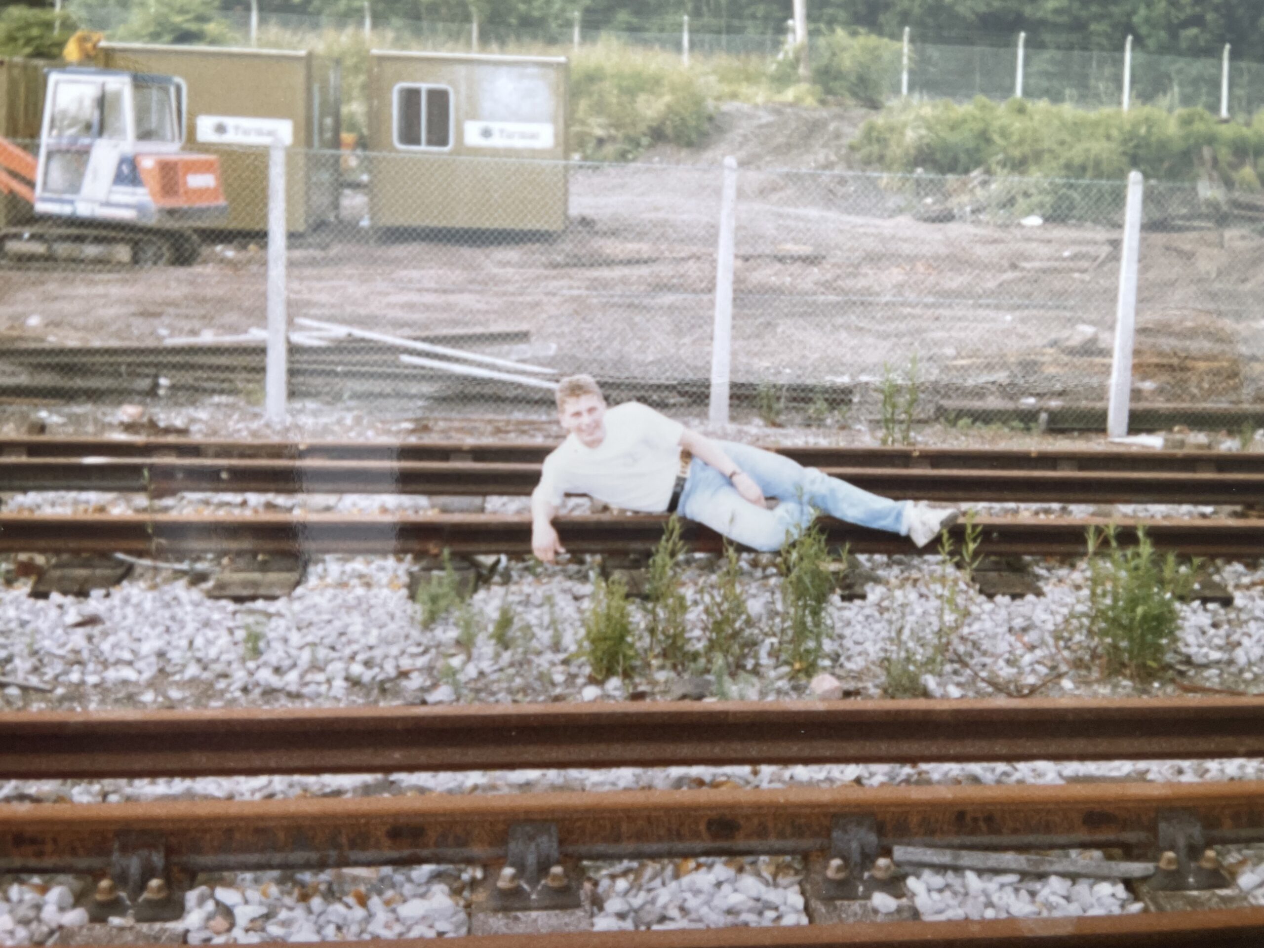 SprogArt relaxing on the railway tracks